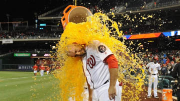 May 9, 2016; Washington, DC, USA; Washington Nationals first baseman Clint Robinson (25) is doused with Gatorade after hitting a walk off homer against the Detroit Tigers during the ninth inning at Nationals Park. Mandatory Credit: Brad Mills-USA TODAY Sports