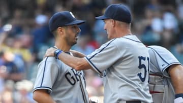 Jun 25, 2016; Milwaukee, WI, USA; Washington Nationals pitcher Gio Gonzalez (47) gets some advice from pitching coach Mike Maddux in the third inning during the game against the Milwaukee Brewers at Miller Park. Mandatory Credit: Benny Sieu-USA TODAY Sports