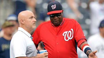 Jun 18, 2016; San Diego, CA, USA; Washington Nationals manager Dusty Baker (R) talks to general manager Mike Rizzo before the game against the San Diego Padres at Petco Park. Mandatory Credit: Jake Roth-USA TODAY Sports
