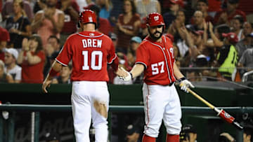 Jul 16, 2016; Washington, DC, USA; Washington Nationals shortstop Stephen Drew (10) is congratulated by Nationals pitcher Tanner Roark (57) after scoring a run against the Pittsburgh Pirates during the second inning at Nationals Park. Mandatory Credit: Brad Mills-USA TODAY Sports