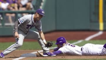 Jun 14, 2015; Omaha, NE, USA; LSU Tigers runner Andrew Stevenson (6) slides safely against TCU Horned Frogs third baseman Derek Odell (5) during the second inning at TD Ameritrade Park. TCU won 10-3. Mandatory Credit: Bruce Thorson-USA TODAY Sports