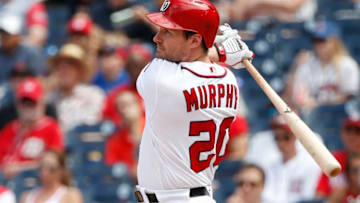 WASHINGTON, DC - AUGUST 09: Daniel Murphy #20 of the Washington Nationals hits an RBI double scoring Anthony Rendon #6 (not pictured) in the sixth inning against the Atlanta Braves at Nationals Park on August 9, 2018 in Washington, DC. (Photo by Patrick McDermott/Getty Images)