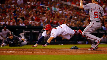 ST. LOUIS, MO - AUGUST 15: Harrison Bader #48 of the St. Louis Cardinals scores a run on a wild pitch against the Washington Nationals in the fifth inning at Busch Stadium on August 15, 2018 in St. Louis, Missouri. (Photo by Dilip Vishwanat/Getty Images)