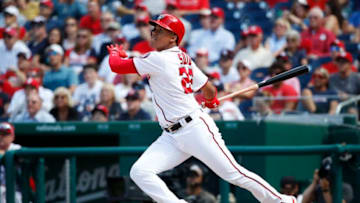 WASHINGTON, DC - AUGUST 23: Juan Soto #22 of the Washington Nationals hits a fly ball out to left field in the ninth inning against the Philadelphia Phillies at Nationals Park on August 23, 2018 in Washington, DC. (Photo by Patrick McDermott/Getty Images)