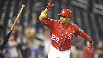 WASHINGTON, DC - SEPTEMBER 01: Juan Soto #22 of the Washington Nationals throws the bat after singling in two runs in the eighth inning during a baseball game against the Milwaukee Brewers at Nationals Park on September 1, 2018 in Washington, DC. (Photo by Mitchell Layton/Getty Images)