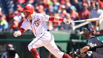 WASHINGTON, DC - SEPTEMBER 02: Mark Reynolds #14 of the Washington Nationals singles in tow runs in the third inning during a baseball game against the Milwaukee Brewers at Nationals Park on September 2, 2018 in Washington, DC. (Photo by Mitchell Layton/Getty Images)