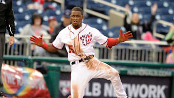 WASHINGTON, DC - SEPTEMBER 23: Victor Robles #16 of the Washington Nationals celebrates after hitting a triple in the eighth inning against the New York Mets at Nationals Park on September 23, 2018 in Washington, DC. (Photo by Greg Fiume/Getty Images)