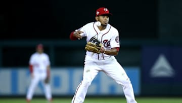 WASHINGTON, DC - SEPTEMBER 26: Adrian Sanchez #5 of the Washington Nationals bobbles the ball while attempting a double play against the Miami Marlins in the sixth inning at Nationals Park on September 26, 2018 in Washington, DC. (Photo by Rob Carr/Getty Images)