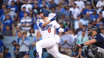 LOS ANGELES, CA - OCTOBER 17: Brian Dozier #6 of the Los Angeles Dodgers hits a RBI ground out against the Milwaukee Brewers during the seventh inning in Game Five of the National League Championship Series at Dodger Stadium on October 17, 2018 in Los Angeles, California. (Photo by Kevork Djansezian/Getty Images)