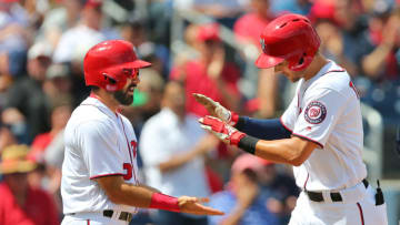 WEST PALM BEACH, FL - MARCH 13: Trea Turner #7 of the Washington Nationals is congratulated by Adam Eaton #2 after hitting a two-run home run against the Atlanta Braves in the first inning of a spring training baseball game at Fitteam Ballpark of the Palm Beaches on March 13, 2019 in West Palm Beach, Florida. The Nationals defeated the Braves 8-4. (Photo by Rich Schultz/Getty Images)