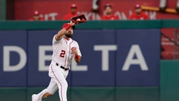 WASHINGTON, DC - APRIL 17: Adam Eaton #2 of the Washington Nationals catches a fly ball hit by Kevin Pillar #1 of the San Francisco Giants (not pictured) in the second inning at Nationals Park on April 17, 2019 in Washington, DC. (Photo by Patrick McDermott/Getty Images)