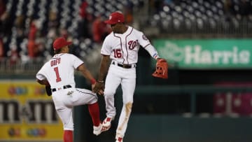 WASHINGTON, DC - APRIL 17: Wilmer Difo #1 and Victor Robles #16 of the Washington Nationals celebrate after a 9-6 win over the San Francisco Giants at Nationals Park on April 17, 2019 in Washington, DC. (Photo by Patrick McDermott/Getty Images)