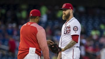 WASHINGTON, DC - April 27: Justin Miller #60 of the Washington Nationals is relived by manager Dave Martinez #4 of the Washington Nationals during the tenth inning against the San Diego Padres at Nationals Park on April 27, 2019 in Washington, DC. (Photo by Scott Taetsch/Getty Images)
