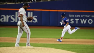 NEW YORK, NEW YORK - MAY 21: J.D. Davis #28 of the New York Mets rounds the bases after hitting an eighth inning three run home run against Wander Suero #51 of the Washington Nationals during their game at Citi Field on May 21, 2019 in New York City. (Photo by Al Bello/Getty Images)