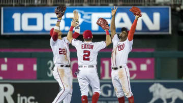 WASHINGTON, DC - JUNE 20: Juan Soto #22, Adam Eaton #2, and Victor Robles #16 of the Washington Nationals celebrate after the game against the Philadelphia Phillies at Nationals Park on June 20, 2019 in Washington, DC. (Photo by Scott Taetsch/Getty Images)