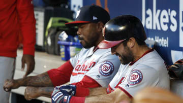 Adam Eaton #2 and Howie Kendrick #47 of the Washington Nationals celebrate in the dugout after hitting a home run against the New York Mets in the first inning during their game at Citi Field on May 22, 2019 in New York City. (Photo by Michael Owens/Getty Images)