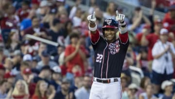 WASHINGTON, DC - JUNE 21: Juan Soto #22 of the Washington Nationals reacts after hitting a triple against the Atlanta Braves during the fifth inning at Nationals Park on June 21, 2019 in Washington, DC. (Photo by Scott Taetsch/Getty Images)