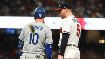 ATLANTA, GEORGIA - AUGUST 17: Freddie Freeman #5 of the Atlanta Braves talks to Justin Turner #10 of the Los Angeles Dodgers at SunTrust Park on August 17, 2019 in Atlanta, Georgia. (Photo by Logan Riely/Getty Images)