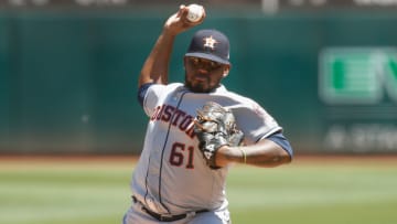 Rogelio Armenteros #61 of the Houston Astros pitches against the Oakland Athletics at Ring Central Coliseum on August 17, 2019 in Oakland, California. (Photo by Lachlan Cunningham/Getty Images)