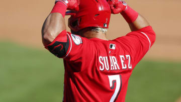 ATLANTA, GA - SEPTEMBER 30: Eugenio Suarez #7 of the Cincinnati Reds reacts after hitting a single in the thirteenth inning of Game One of the National League Wild Card Series against the Atlanta Braves at Truist Park on September 30, 2020 in Atlanta, Georgia. (Photo by Todd Kirkland/Getty Images)