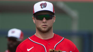 Carter Kieboom #8 of the Washington Nationals warms up before the Spring Training game against the Houston Astros at FITTEAM Ballpark on March 1, 2021 in West Palm Beach, Florida. (Photo by Eric Espada/Getty Images)