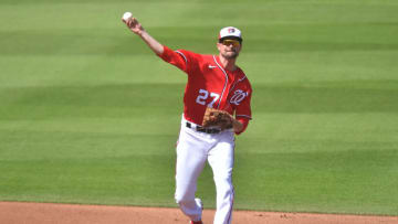 Jordy Mercer #27 of the Washington Nationals throws towards first base during the Spring Training game against the Houston Astros at FITTEAM Ballpark on March 1, 2021 in West Palm Beach, Florida. (Photo by Eric Espada/Getty Images)