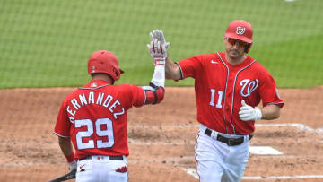 Ryan Zimmerman #11 of the Washington Nationals is congratulated by Yadiel Hernandez #29 after hitting a home run during the third inning of the Spring Training game against the Houston Astros at FITTEAM Ballpark on March 1, 2021 in West Palm Beach, Florida. (Photo by Eric Espada/Getty Images)
