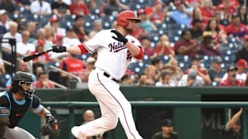 Jon Lester #34 of the Washington Nationals hits a single in the second inning during a baseball game against the Miami Marlins at Nationals Park on July 19, 2021 in Washington, DC. (Photo by Mitchell Layton/Getty Images)