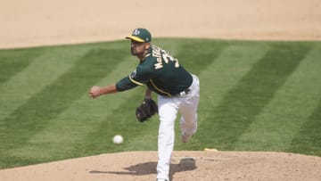 T.J. McFarland #38 of the Oakland Athletics pitches against the San Diego Padres in the top of the six inning at RingCentral Coliseum on September 06, 2020 in Oakland, California. (Photo by Thearon W. Henderson/Getty Images)