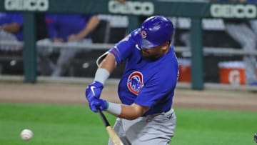 Kyle Schwarber #12 of the Chicago Cubs hits a solo home run in the 2nd inning against the Chicago White Sox at Guaranteed Rate Field on September 25, 2020 in Chicago, Illinois. (Photo by Jonathan Daniel/Getty Images)
