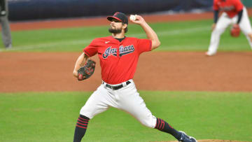 Closing pitcher Brad Hand #33 of the Cleveland Indians pitches during the ninth inning of Game Two of the American League Wild Card Series against the New York Yankees at Progressive Field on September 30, 2020 in Cleveland, Ohio. The Yankees defeated the Indians 10-9. (Photo by Jason Miller/Getty Images)