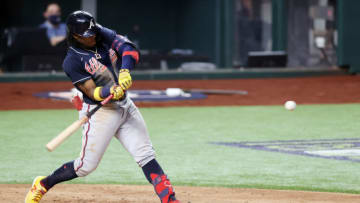 ARLINGTON, TEXAS - OCTOBER 18: Ronald Acuna Jr. #13 of the Atlanta Braves flies out against the Los Angeles Dodgers during the second inning in Game Seven of the National League Championship Series at Globe Life Field on October 18, 2020 in Arlington, Texas. (Photo by Tom Pennington/Getty Images)