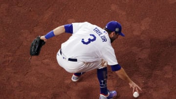 Chris Taylor #3 of the Los Angeles Dodgers fields the ball against the Tampa Bay Rays during the seventh inning in Game One of the 2020 MLB World Series at Globe Life Field on October 20, 2020 in Arlington, Texas. (Photo by Sean M. Haffey/Getty Images)