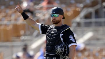 Jonathan Lucroy #23 of the Chicago White Sox catches against the Los Angeles Dodgers on March 8, 2021 at Camelback Ranch in Glendale, Arizona. (Photo by Ron Vesely/Getty Images)