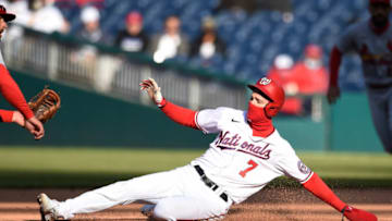 Trea Turner #7 of the Washington Nationals steals second base against Paul DeJong #11 of the St. Louis Cardinals in the sixth inning at Nationals Park on April 21, 2021 in Washington, DC. (Photo by Patrick McDermott/Getty Images)