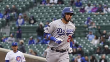 Keibert Ruiz #25 of the Los Angeles Dodgers hits a home run during the seventh inning of game one of a doubleheader against the Chicago Cubs at Wrigley Field on May 04, 2021 in Chicago, Illinois. (Photo by Nuccio DiNuzzo/Getty Images)