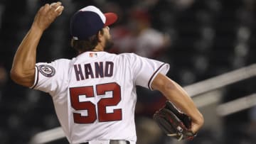 Brad Hand #52 of the Washington Nationals pitches against the St. Louis Cardinals in the ninth inning of the MLB game at Nationals Park on April 20, 2021 in Washington, DC. (Photo by Patrick McDermott/Getty Images)