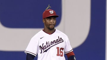 Victor Robles #16 of the Washington Nationals plays center field with a praying mantis on his hat during the game against the Philadelphia Phillies at Nationals Park on August 02, 2021 in Washington, DC. (Photo by G Fiume/Getty Images)