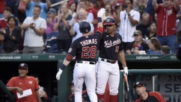 WASHINGTON, DC - SEPTEMBER 04: Lane Thomas #28 of the Washington Nationals celebrates with Juan Soto #22 after hitting a home run in the first inning against the New York Mets during game two of a doubleheader at Nationals Park on September 04, 2021 in Washington, DC. (Photo by Greg Fiume/Getty Images)
