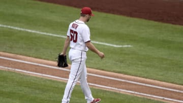 Austin Voth #50 of the Washington Nationals walks to the dugout after being taken out of the game in the ninth inning against the New York Mets at Nationals Park on September 05, 2021 in Washington, DC. (Photo by Greg Fiume/Getty Images)