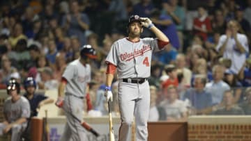 CHICAGO, IL - AUGUST 19: David DeJesus #4 of the Washington Nationals bats against the Chicago Cubs at Wrigley Field on August 19, 2013 in Chicago, Illinois. The Cubs defeated the Nationals 11-1. (Photo by Brian D. Kersey/Getty Images)