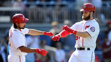 WASHINGTON, DC - AUGUST 28: Bryce Harper #34 of the Washington Nationals celebrates with Anthony Rendon #6 after hitting a home run in the ninth inning against the Colorado Rockies at Nationals Park on August 28, 2016 in Washington, DC. (Photo by Greg Fiume/Getty Images)