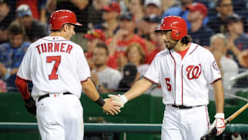 WASHINGTON, DC - SEPTEMBER 12: Trea Turner #7 of the Washington Nationals celebrates with Anthony Rendon #6 after scoring in the first inning against the New York Mets at Nationals Park on September 12, 2016 in Washington, DC. (Photo by Greg Fiume/Getty Images)