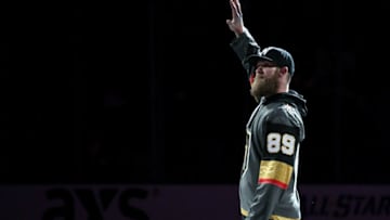 LAS VEGAS, NV - DECEMBER 23: Washington Nationals outfielder Bryce Harper waves to the crowd before dropping the ceremonial puck before a game between the Washington Capitals and the Vegas Golden Knights at T-Mobile Arena on December 23, 2017 in Las Vegas, Nevada. The Golden Knights won 3-0. (Photo by Ethan Miller/Getty Images)