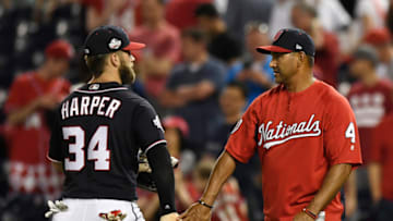 WASHINGTON, DC - MAY 04: Bryce Harper #34 of the Washington Nationals celebrates with manager Dave Martinez #4 after the Nationals defeated the Philadelphia Phillies 7-3 at Nationals Park on May 4, 2018 in Washington, DC. (Photo by Patrick McDermott/Getty Images)