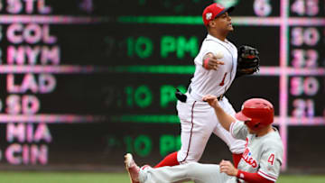 WASHINGTON, DC - MAY 05: Wilmer Difo #1 of the Washington Nationals forces out Scott Kingery #4 of the Philadelphia Phillies to start a double play in the second inning at Nationals Park on May 5, 2018 in Washington, DC. (Photo by Greg Fiume/Getty Images)
