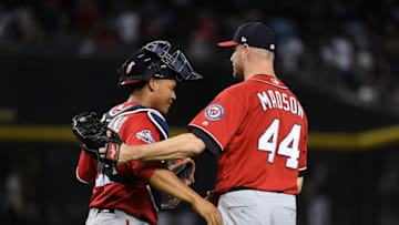 PHOENIX, AZ - MAY 12: Ryan Madson #44 and Pedro Severino #29 of the Washington Nationals celebrate a 2-1 win against the Arizona Diamondbacks at Chase Field on May 12, 2018 in Phoenix, Arizona. (Photo by Norm Hall/Getty Images)