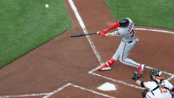 BALTIMORE, MD - MAY 29: Bryce Harper #34 of the Washington Nationals follows hits a solo home run against the Baltimore Orioles in the first inning at Oriole Park at Camden Yards on May 29, 2018 in Baltimore, Maryland. (Photo by Rob Carr/Getty Images)