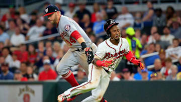 ATLANTA, GA - MAY 31: Ozzie Albies #1 of the Atlanta Braves gets caught between the bases by Matt Adams #15 of the Washington Nationals during the fifth inning at SunTrust Park on May 31, 2018 in Atlanta, Georgia. (Photo by Daniel Shirey/Getty Images)