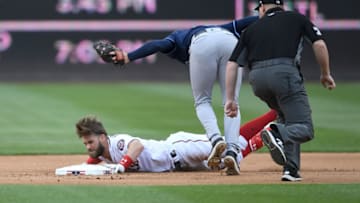 WASHINGTON, DC - JUNE 06: Bryce Harper #34 of the Washington Nationals is tagged out at second base in the fourth inning by Brad Miller #13 of the Tampa Bay Rays at Nationals Park on June 6, 2018 in Washington, DC. (Photo by Greg Fiume/Getty Images)